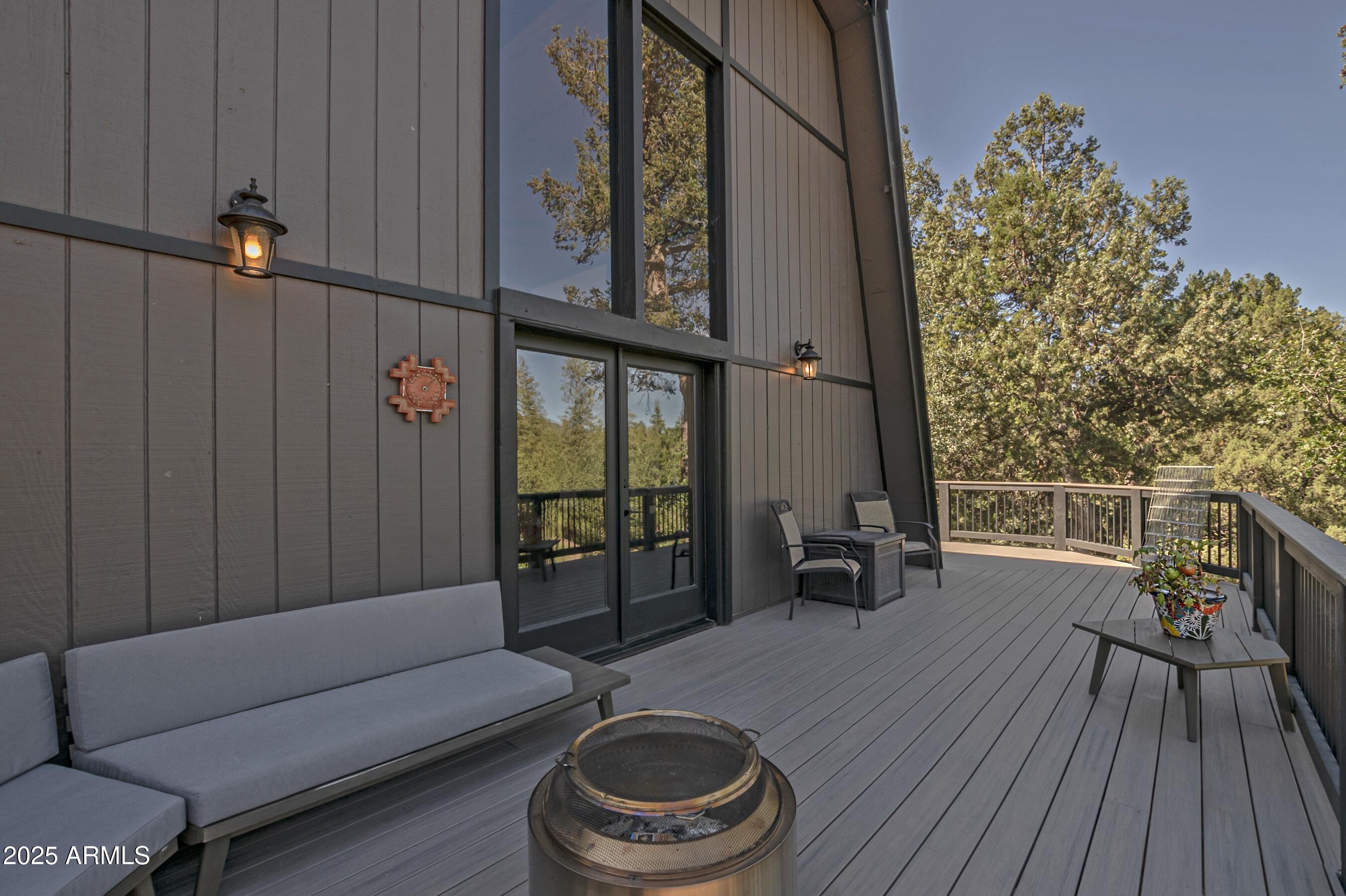4763 Ernies Road Strawberry, AZ 85544 - Photo 31 of 50 a reading room with furniture and wooden floor