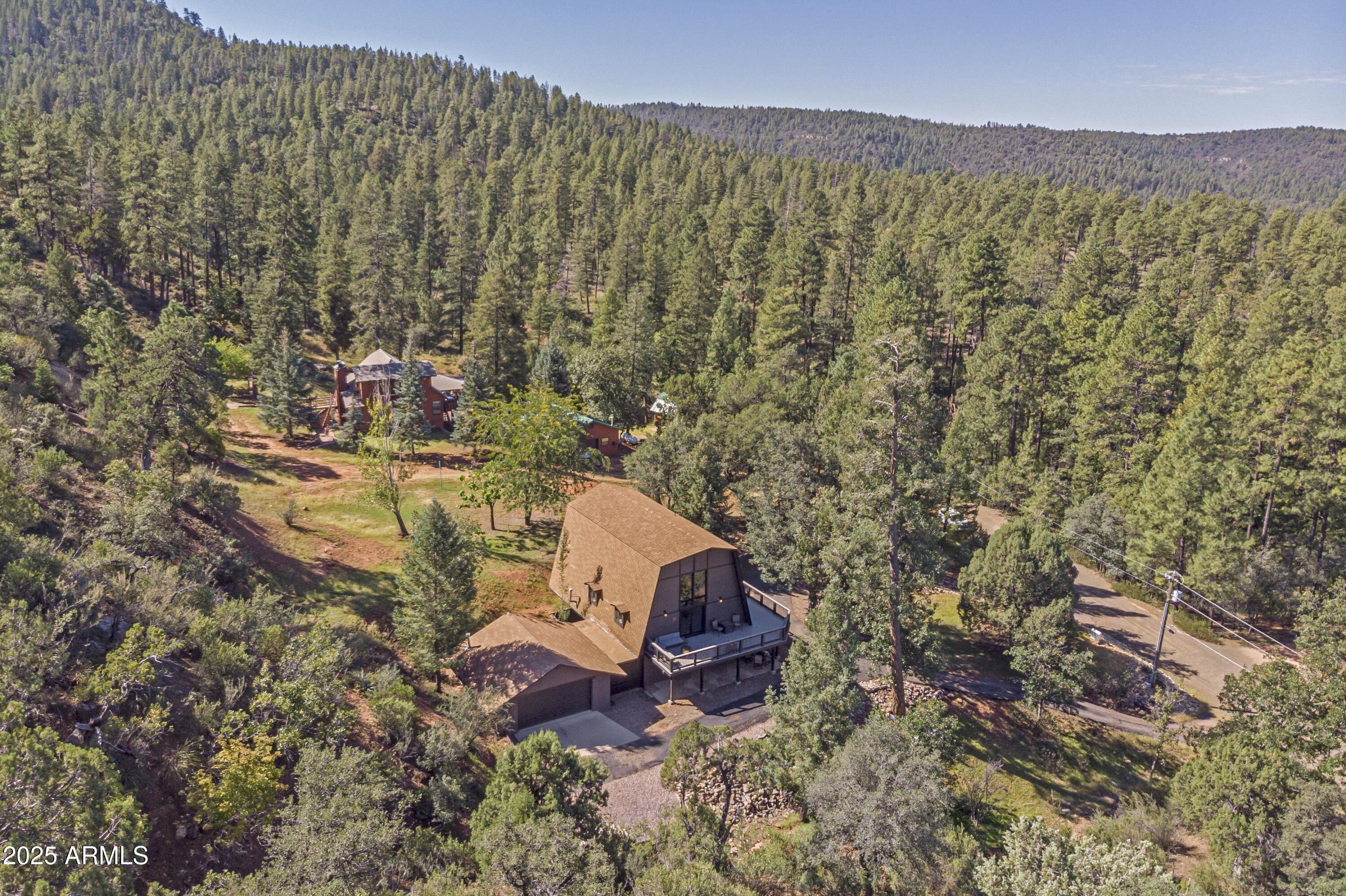 4763 Ernies Road Strawberry, AZ 85544 - Photo 36 of 50 an aerial view of a house with a yard