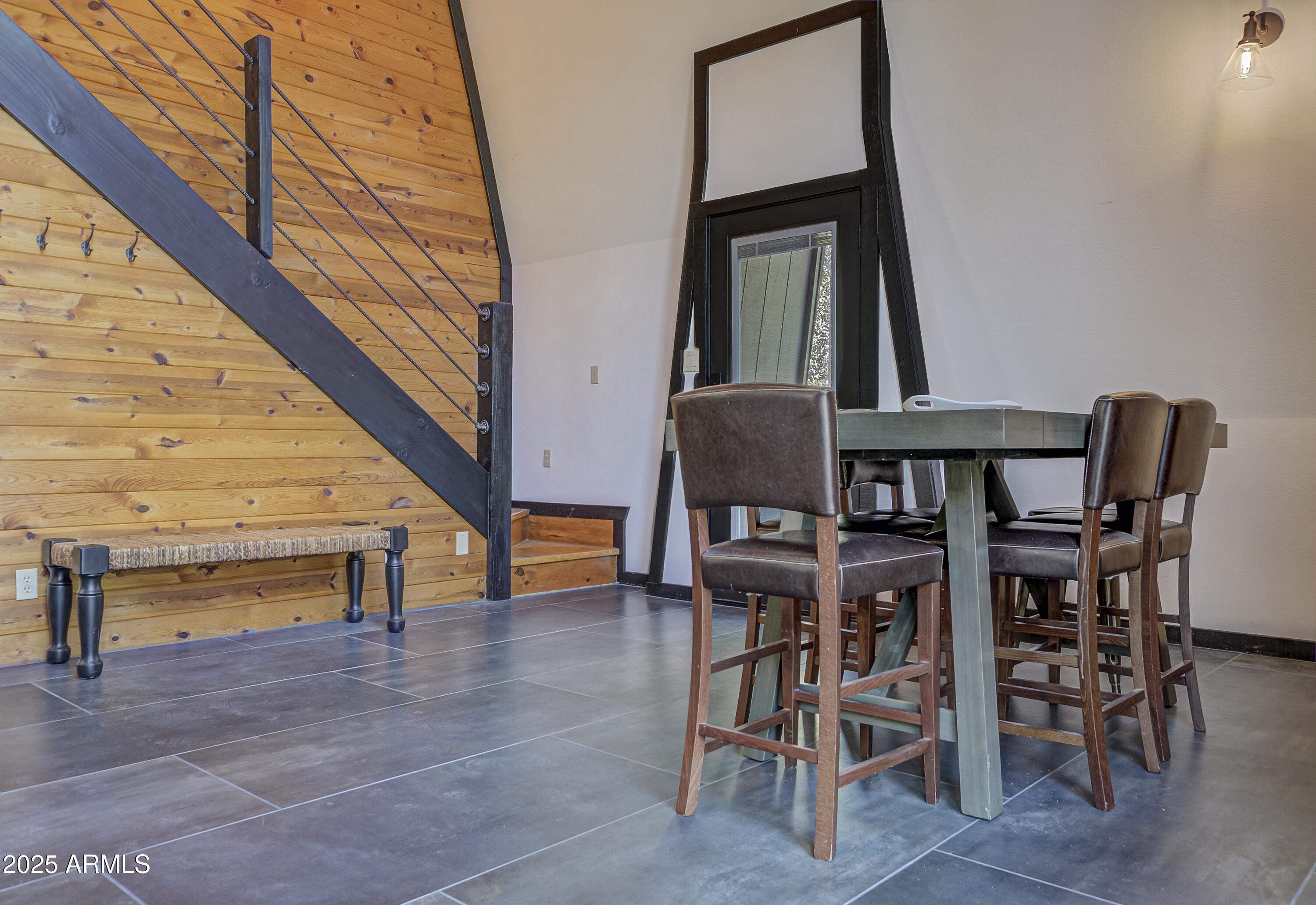 4763 Ernies Road Strawberry, AZ 85544 - Photo 5 of 50 a dining room with furniture and wooden floor