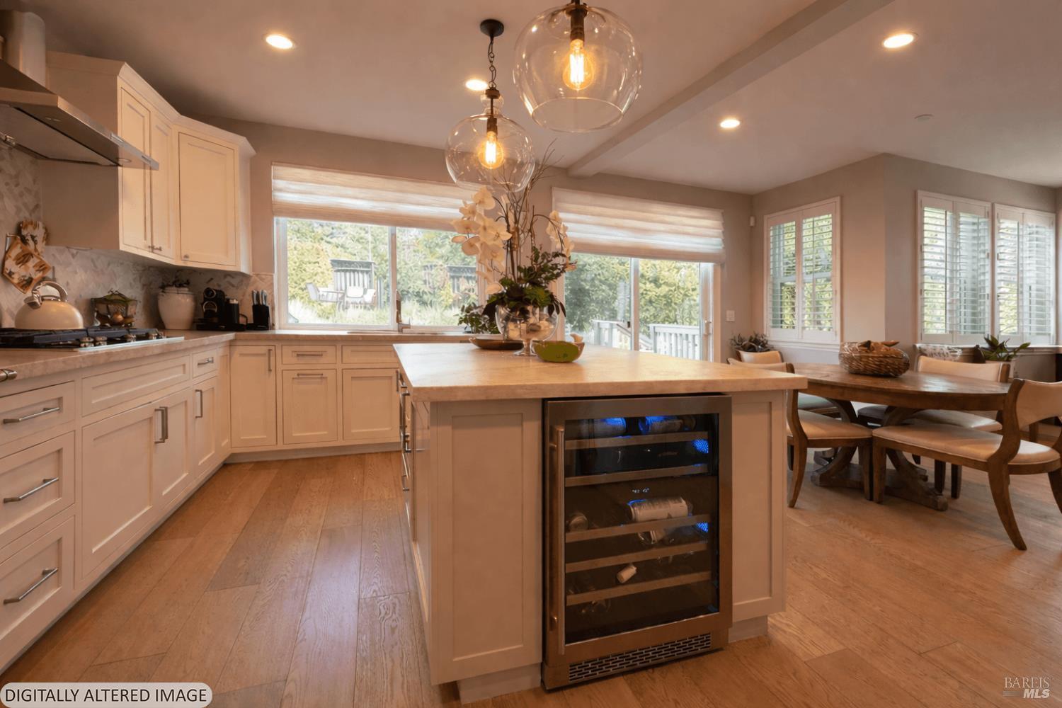 3726 Cannes Place Santa Rosa, CA 95403 - Photo 18 of 69 Look at the size of this amazing kitchen. The entrance to the formal dining room is to the left of this photo. The family room is to the right of this photo. Notice the wine refrigerator in the island.