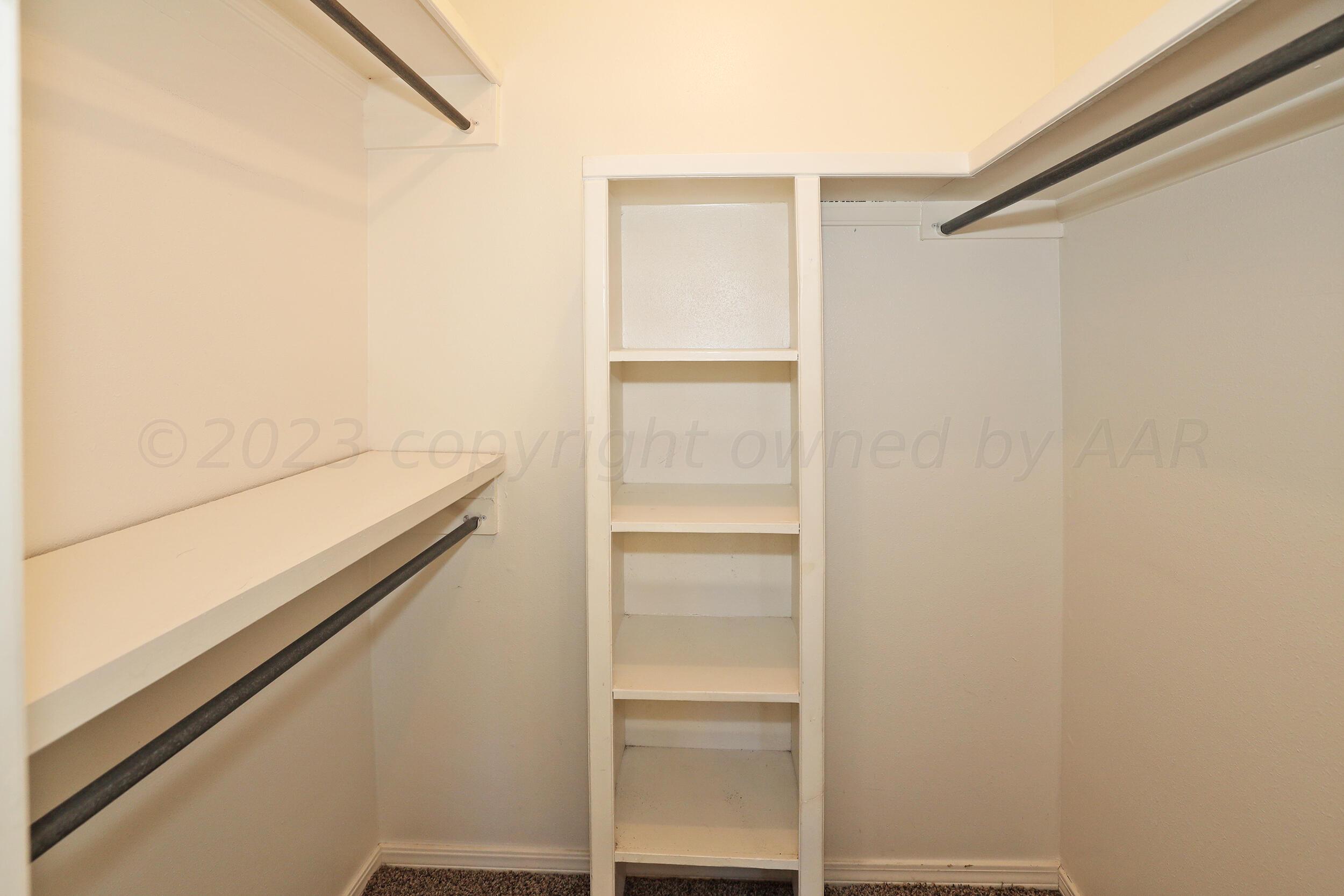 2905 Salem Drive Amarillo, TX 79110 - Photo 17 of 29 a view of an empty walk in closet