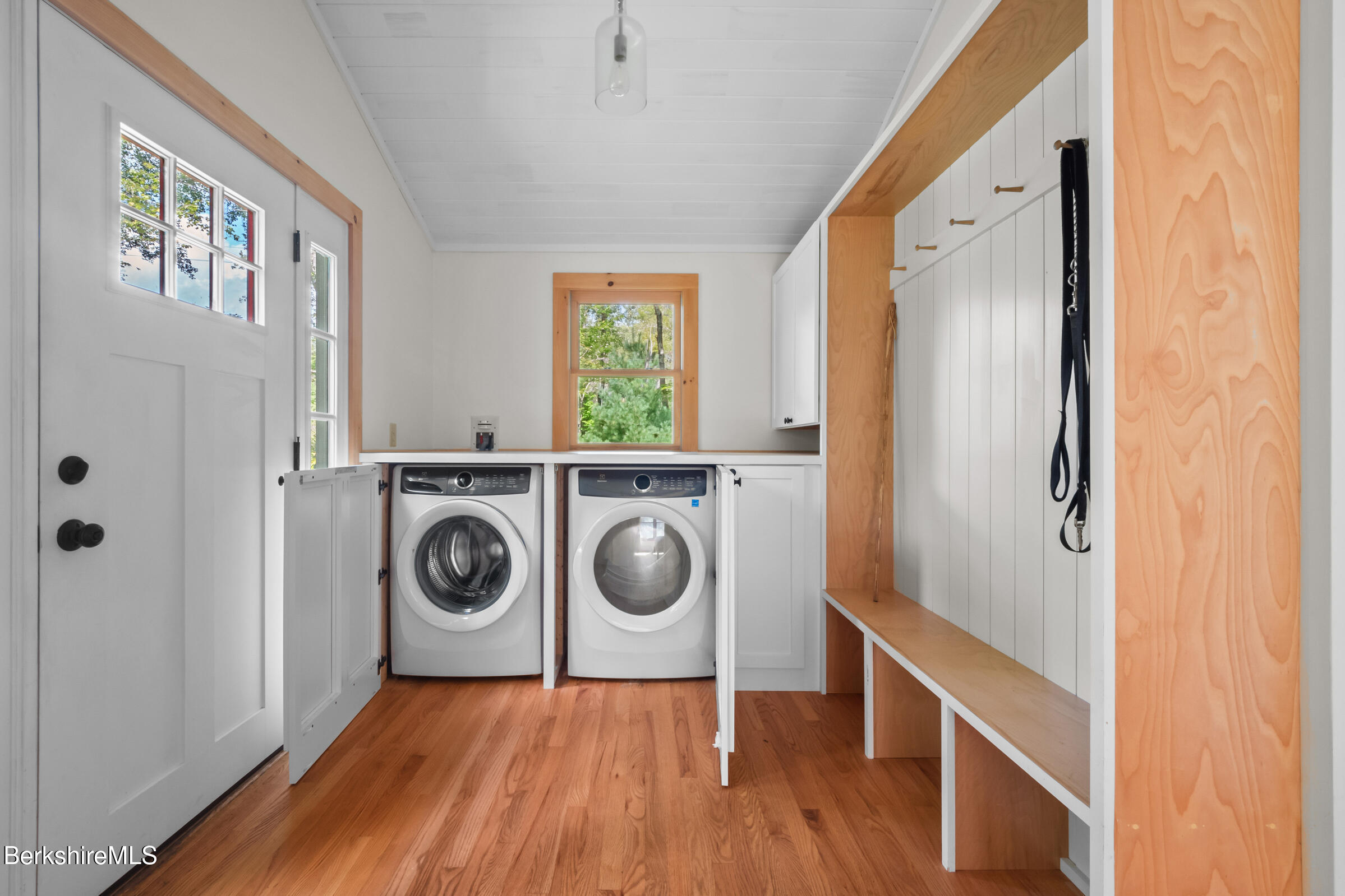 10 Phelps Road Monterey, MA 01245 - Photo 11 of 45 a view of a hallway with washer and dryer