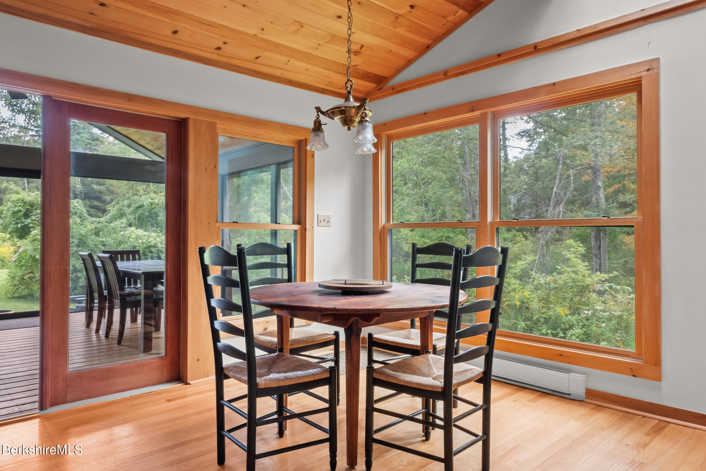 10 Phelps Road Monterey, MA 01245 - Photo 19 of 45 a dining room with furniture and outdoor view