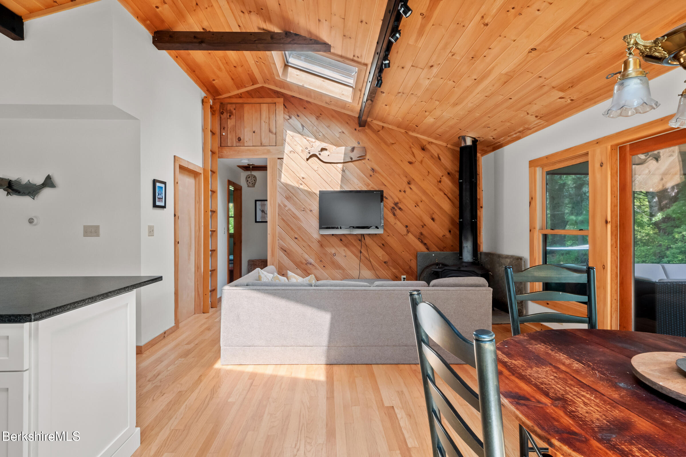 10 Phelps Road Monterey, MA 01245 - Photo 21 of 45 a living room with furniture and a flat screen tv