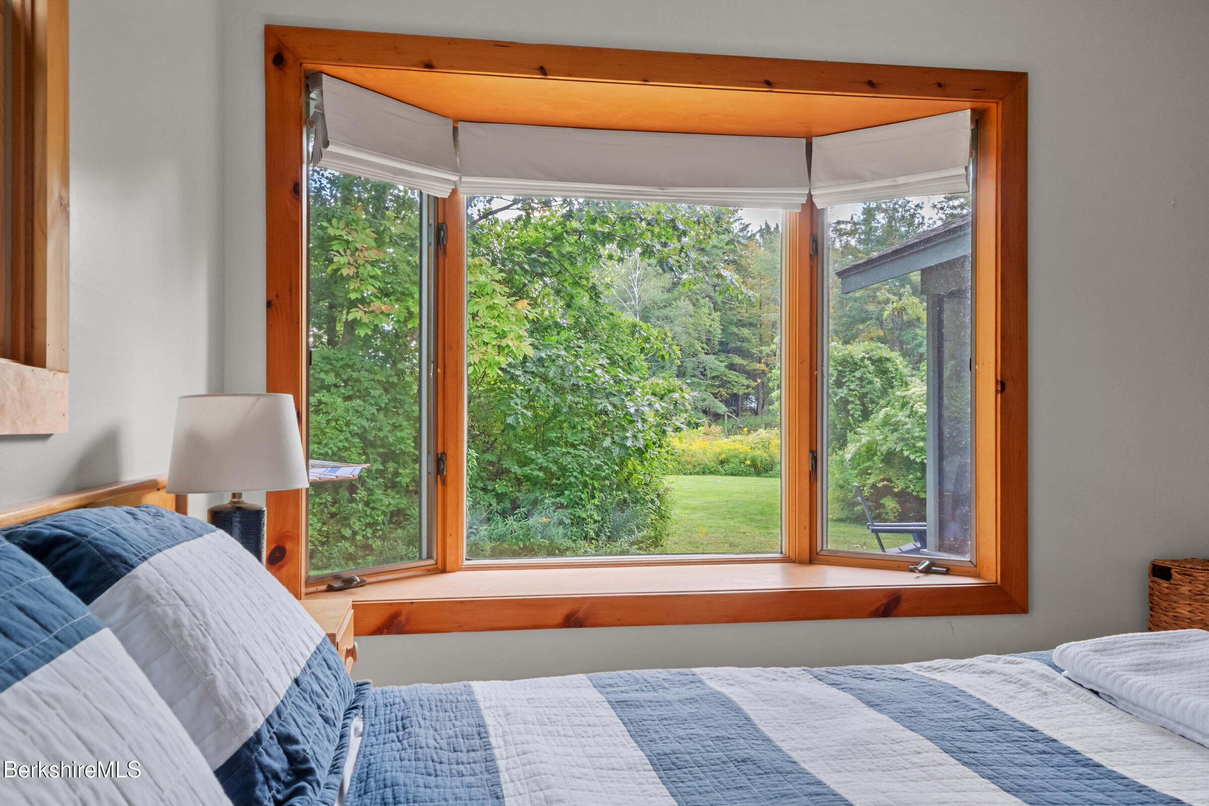 10 Phelps Road Monterey, MA 01245 - Photo 26 of 45 a bedroom with a bed and a window