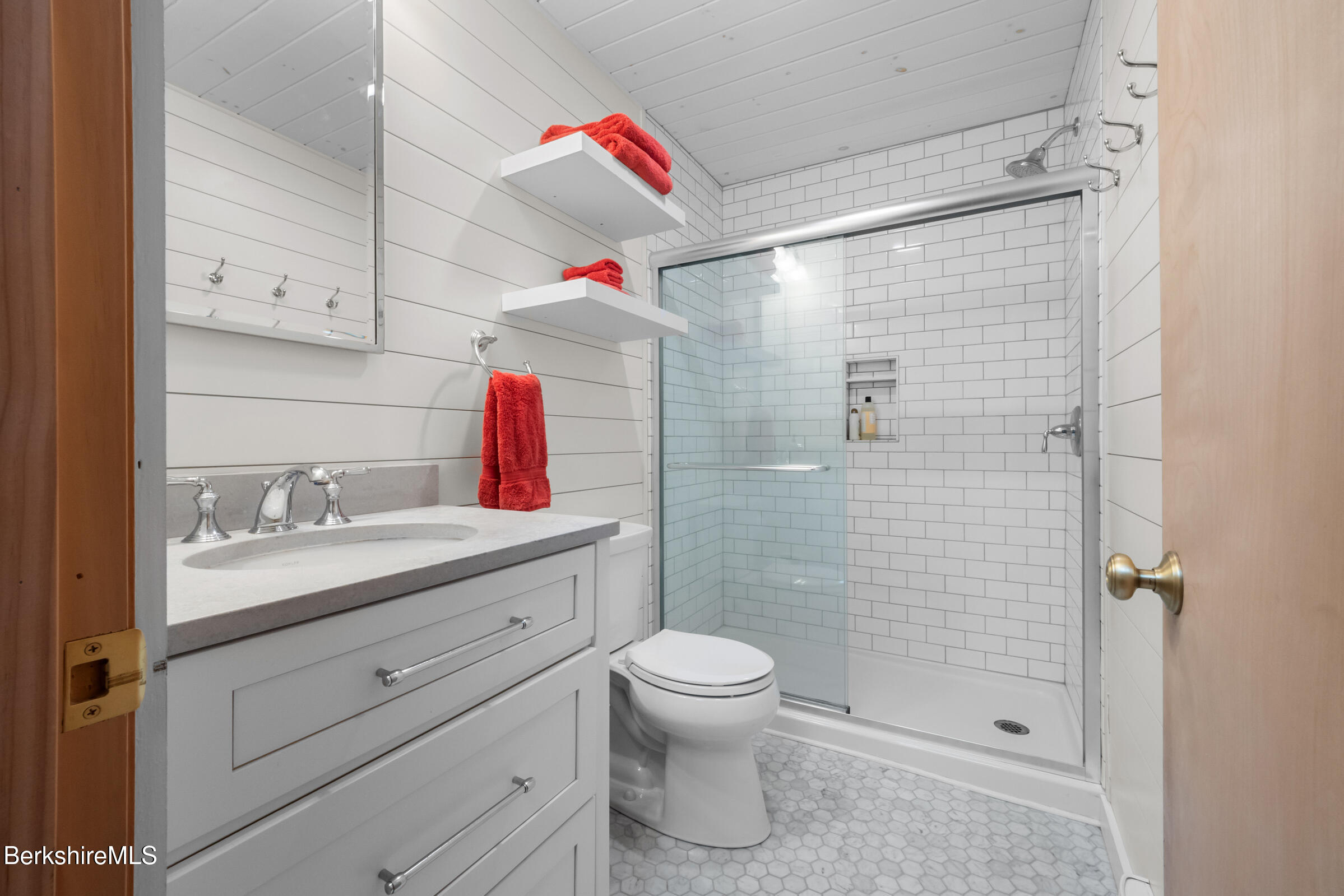 10 Phelps Road Monterey, MA 01245 - Photo 28 of 45 a bathroom with a sink toilet and shower