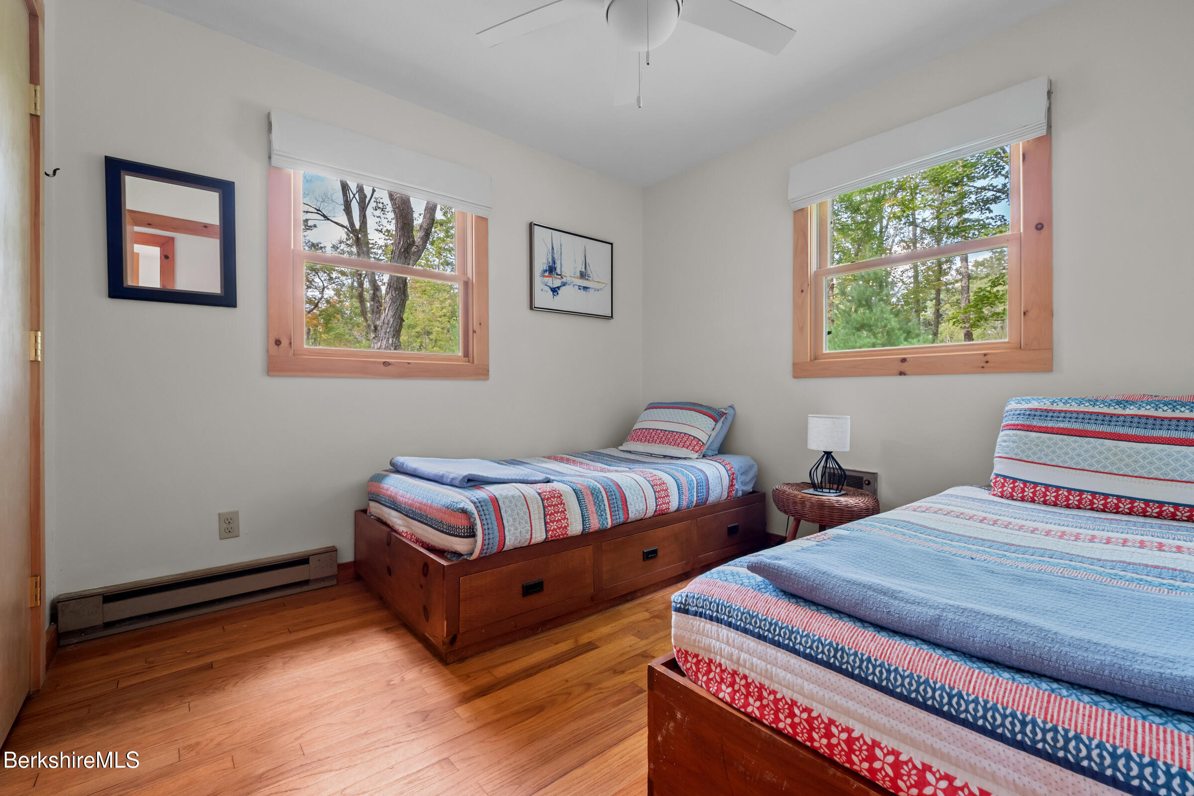 10 Phelps Road Monterey, MA 01245 - Photo 29 of 45 a bedroom with two beds and wooden floor