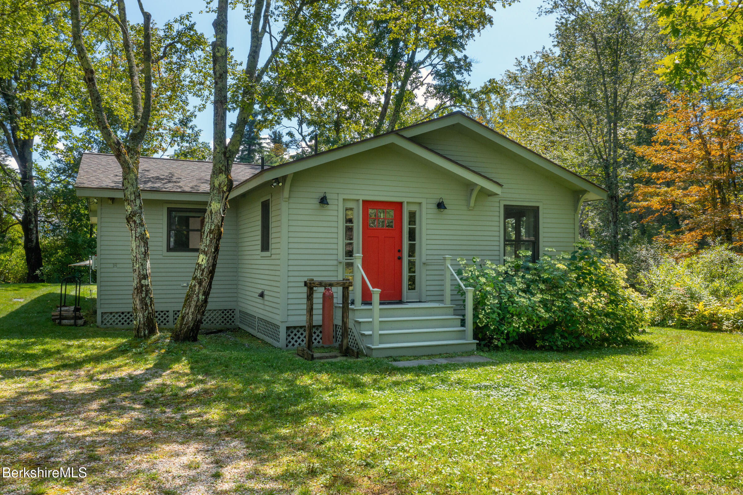 10 Phelps Road Monterey, MA 01245 - Photo 3 of 45 a front view of house with a garden