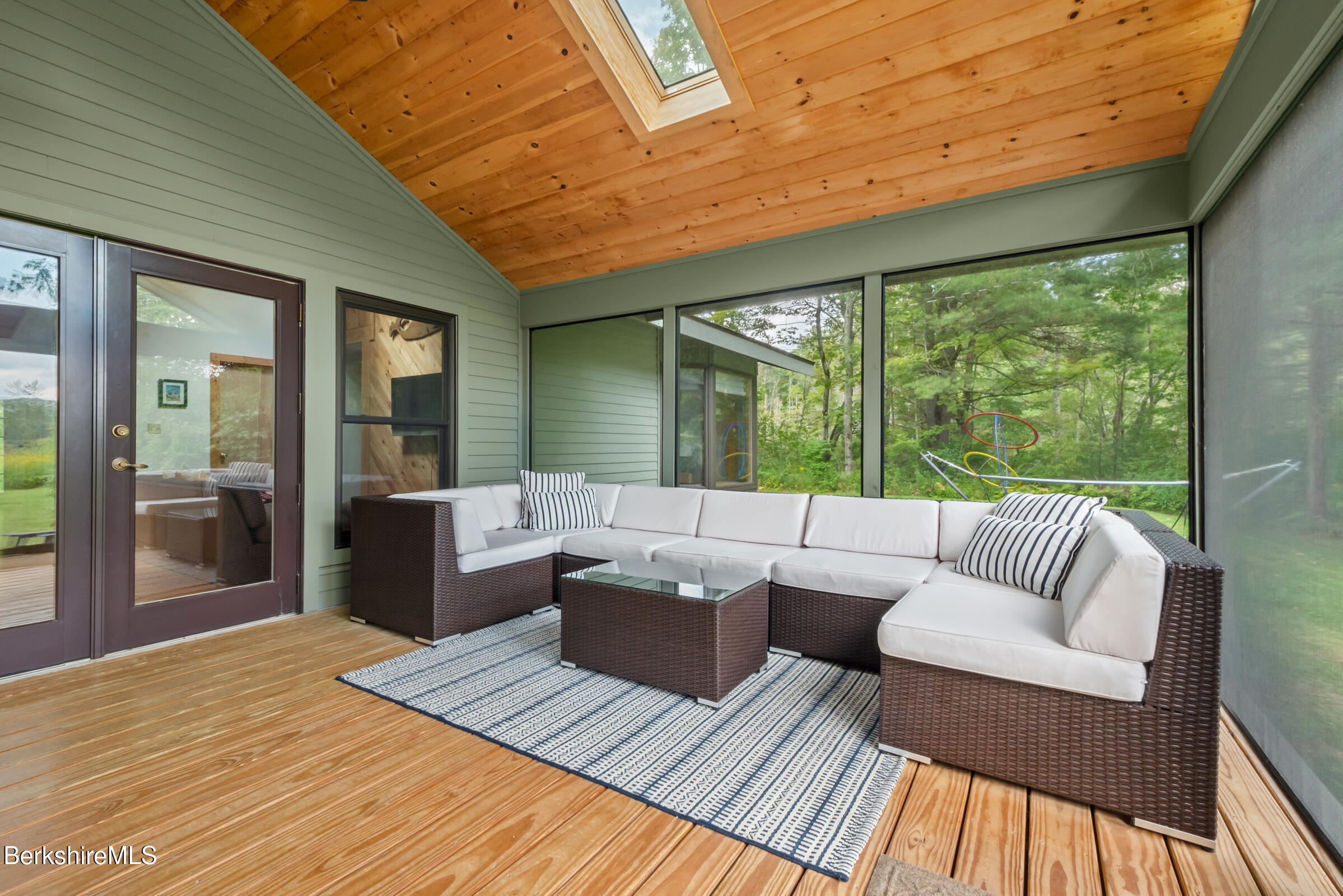 10 Phelps Road Monterey, MA 01245 - Photo 35 of 45 a living room with furniture and a large window