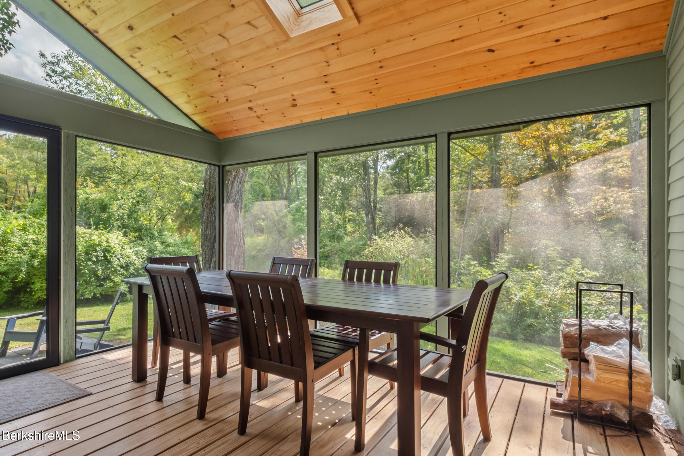 10 Phelps Road Monterey, MA 01245 - Photo 36 of 45 a dining room with furniture window and wooden floor