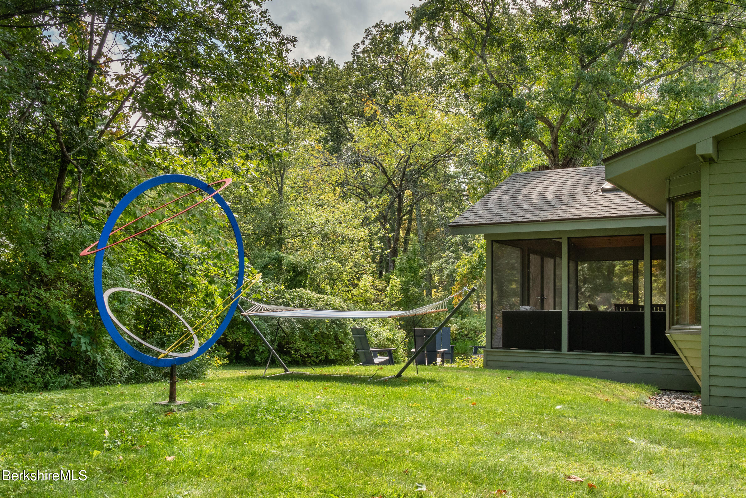 10 Phelps Road Monterey, MA 01245 - Photo 43 of 45 a view of an house with backyard space and a tree