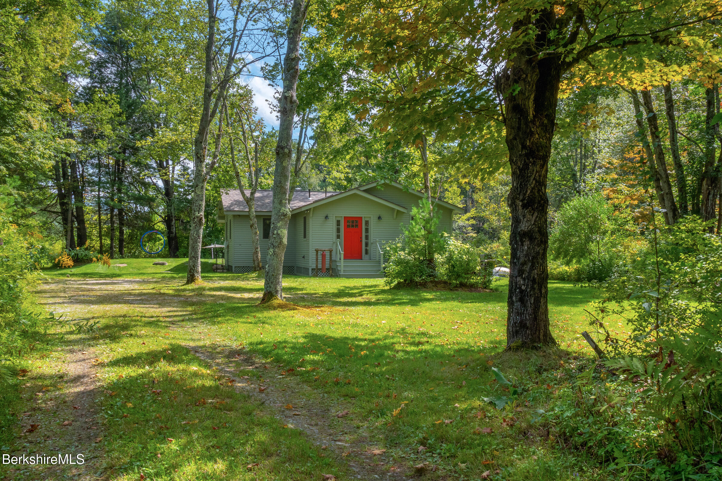10 Phelps Road Monterey, MA 01245 - Photo 45 of 45 a view of a house with a big yard and large trees