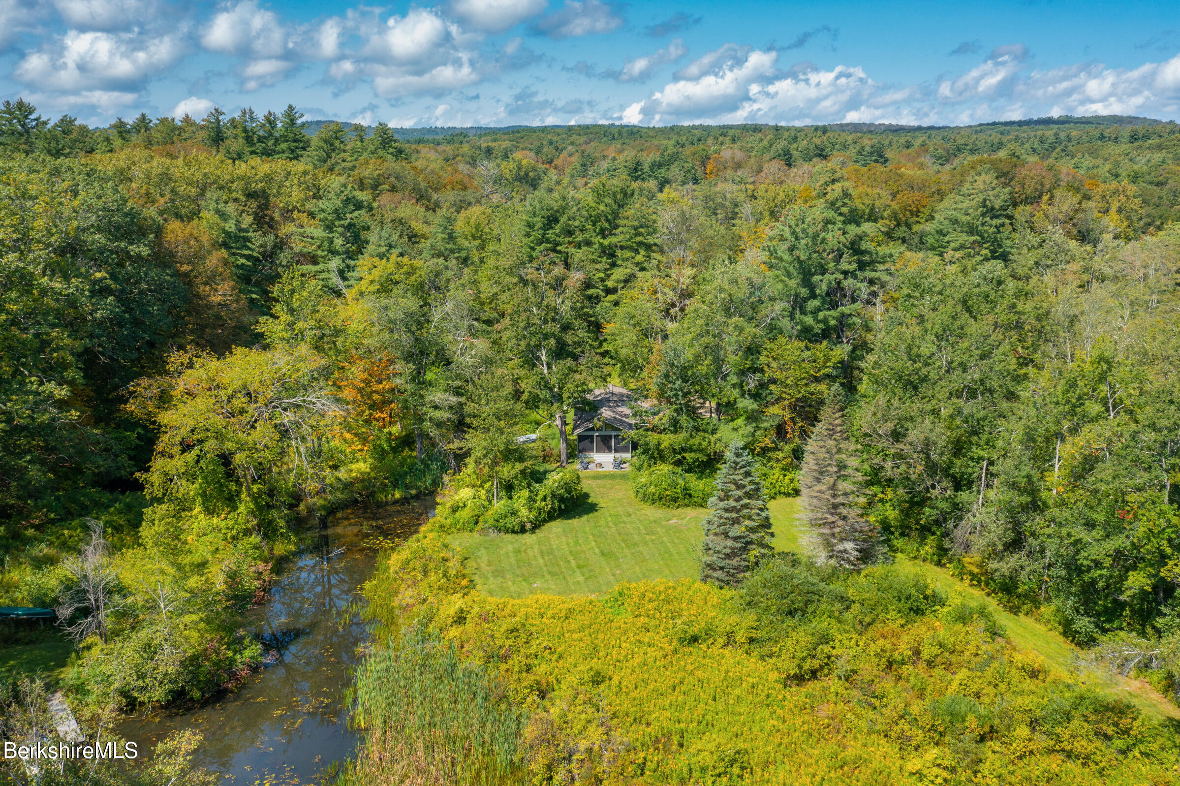 10 Phelps Road Monterey, MA 01245 - Photo 5 of 45 a view of a lake with a yard