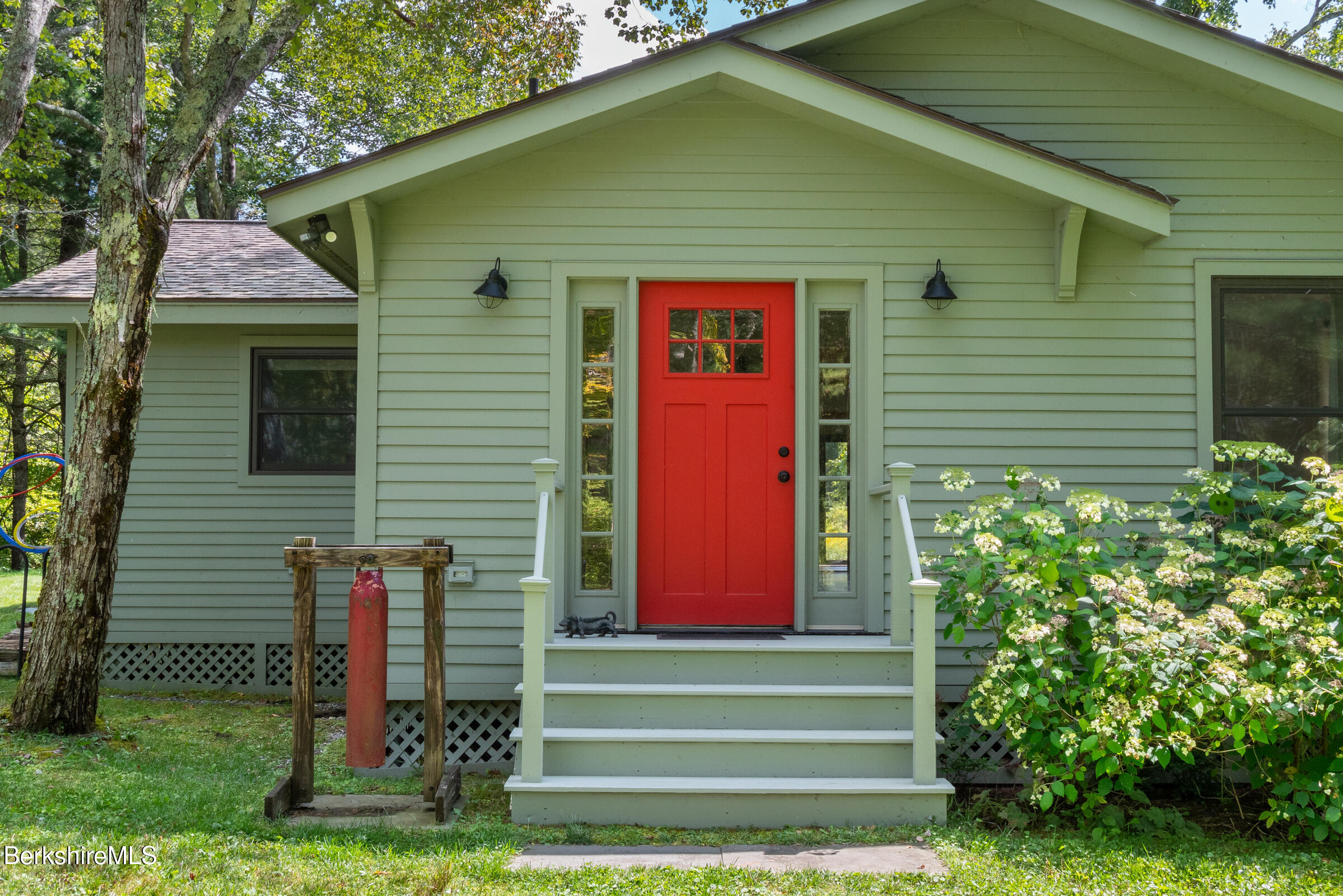 10 Phelps Road Monterey, MA 01245 - Photo 7 of 45 a front view of a house with a yard