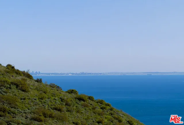 a view of a house with a roof deck