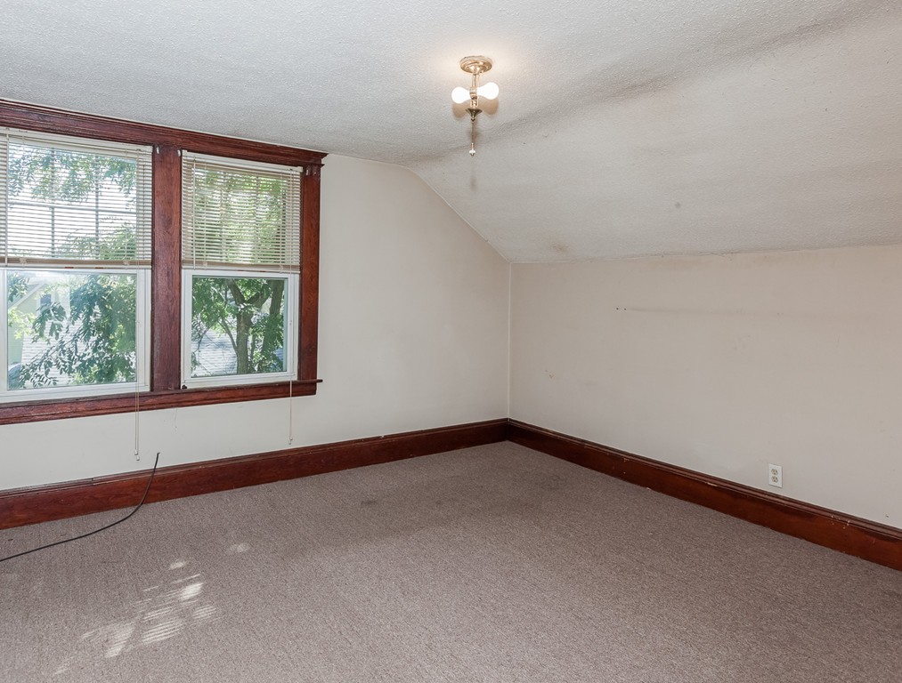 110 Hood Street Springfield, MA 01109 - Photo 15 of 17 a view of a room with a window
