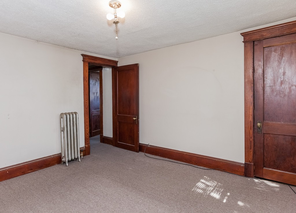 110 Hood Street Springfield, MA 01109 - Photo 16 of 17 an empty room with windows