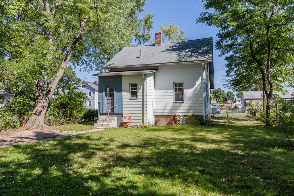 110 Hood Street Springfield, MA 01109 - Photo 3 of 17 a view of a house with a yard