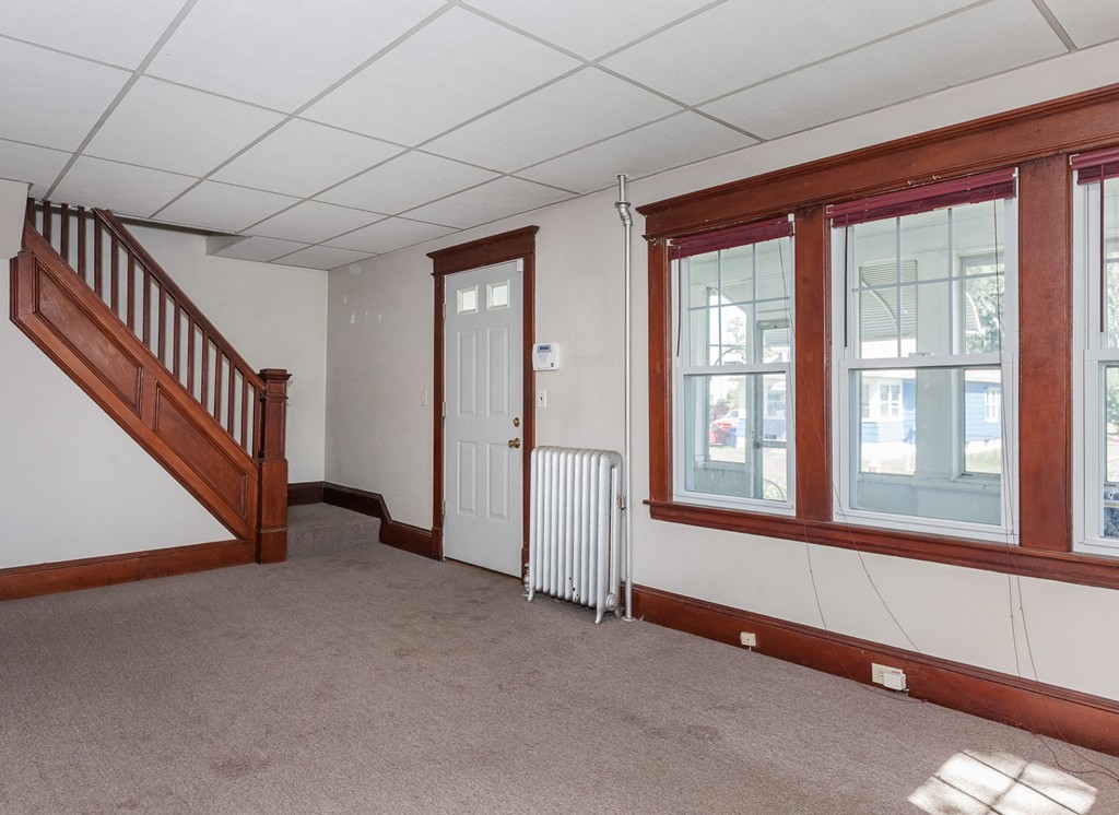 110 Hood Street Springfield, MA 01109 - Photo 5 of 17 an empty room with windows