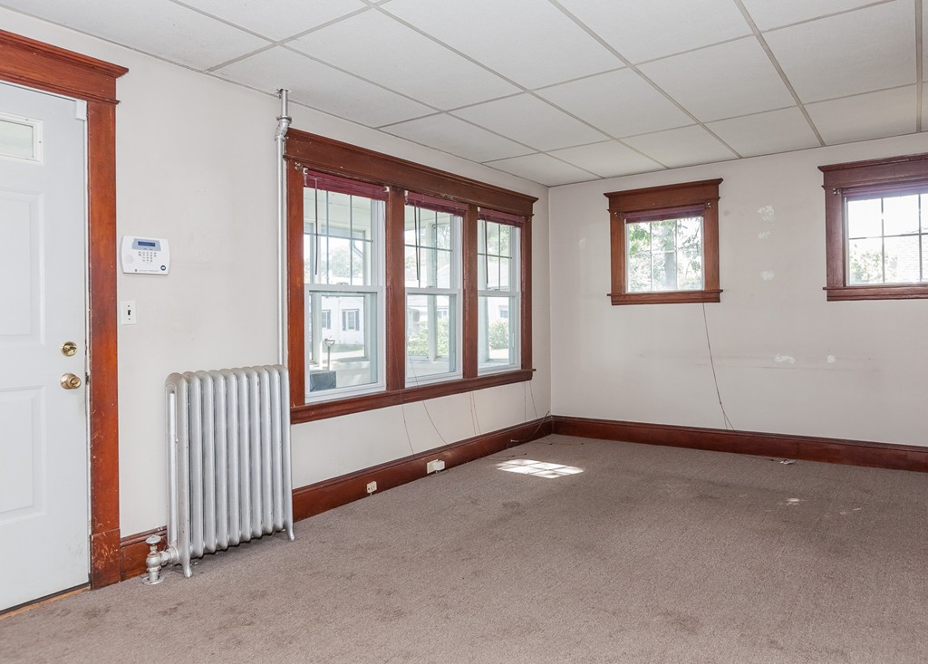 110 Hood Street Springfield, MA 01109 - Photo 6 of 17 an empty room with windows