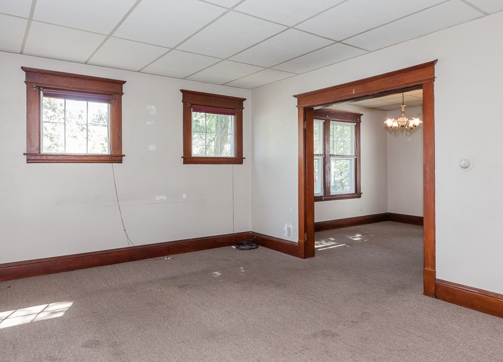 110 Hood Street Springfield, MA 01109 - Photo 7 of 17 a view of an empty room with a window