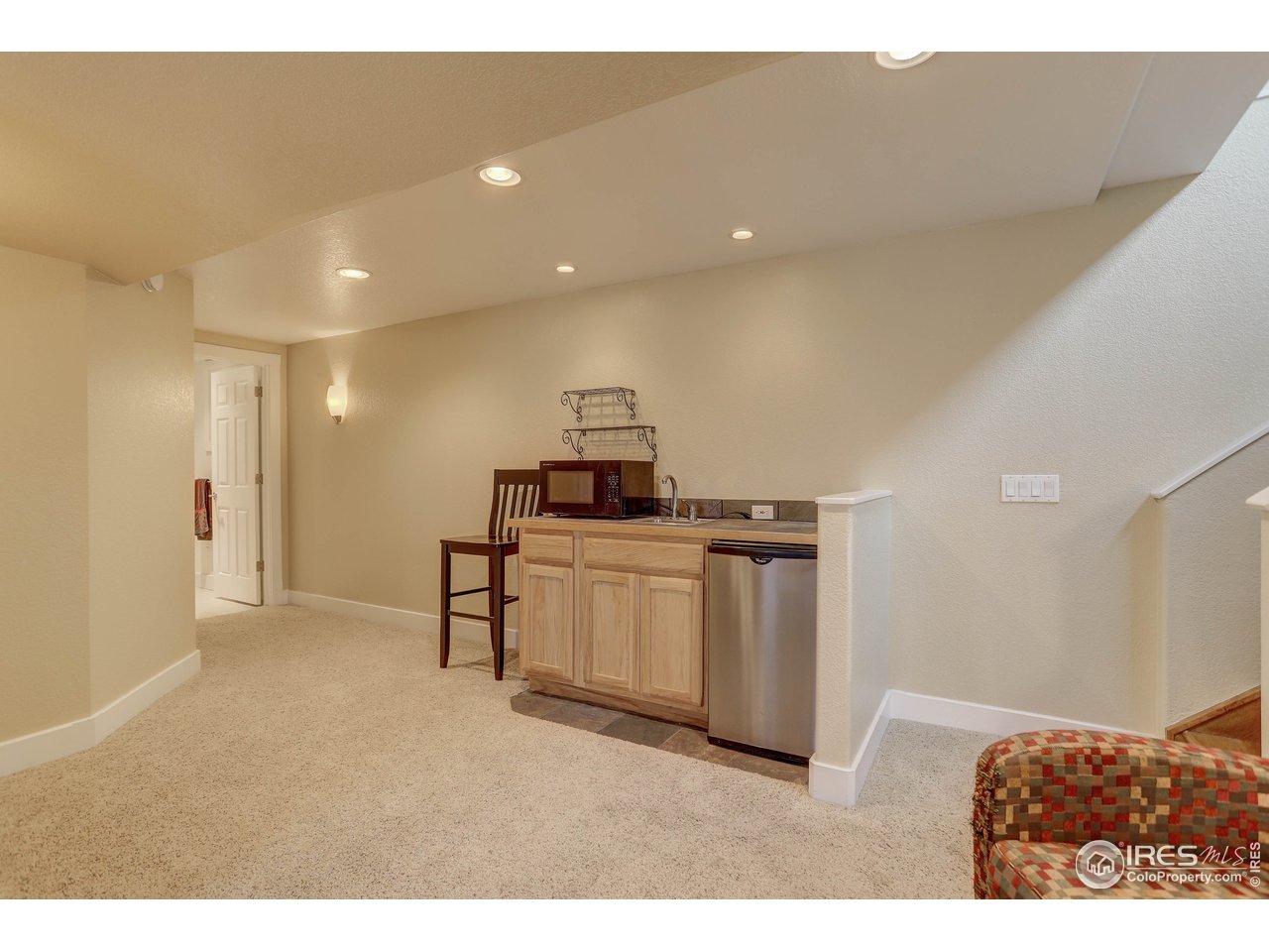 3635 Terry Ridge Road Fort Collins, CO 80524 - Photo 5 of 21 Light and airy rec-room with wet bar
