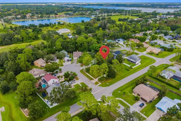 an aerial view of residential house with outdoor space