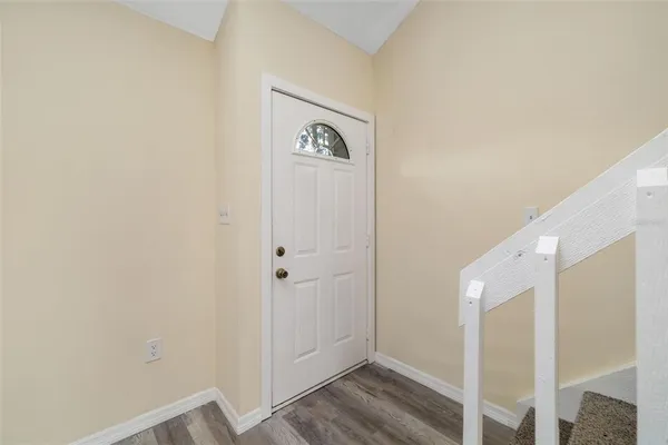 a view of a hallway with closet area