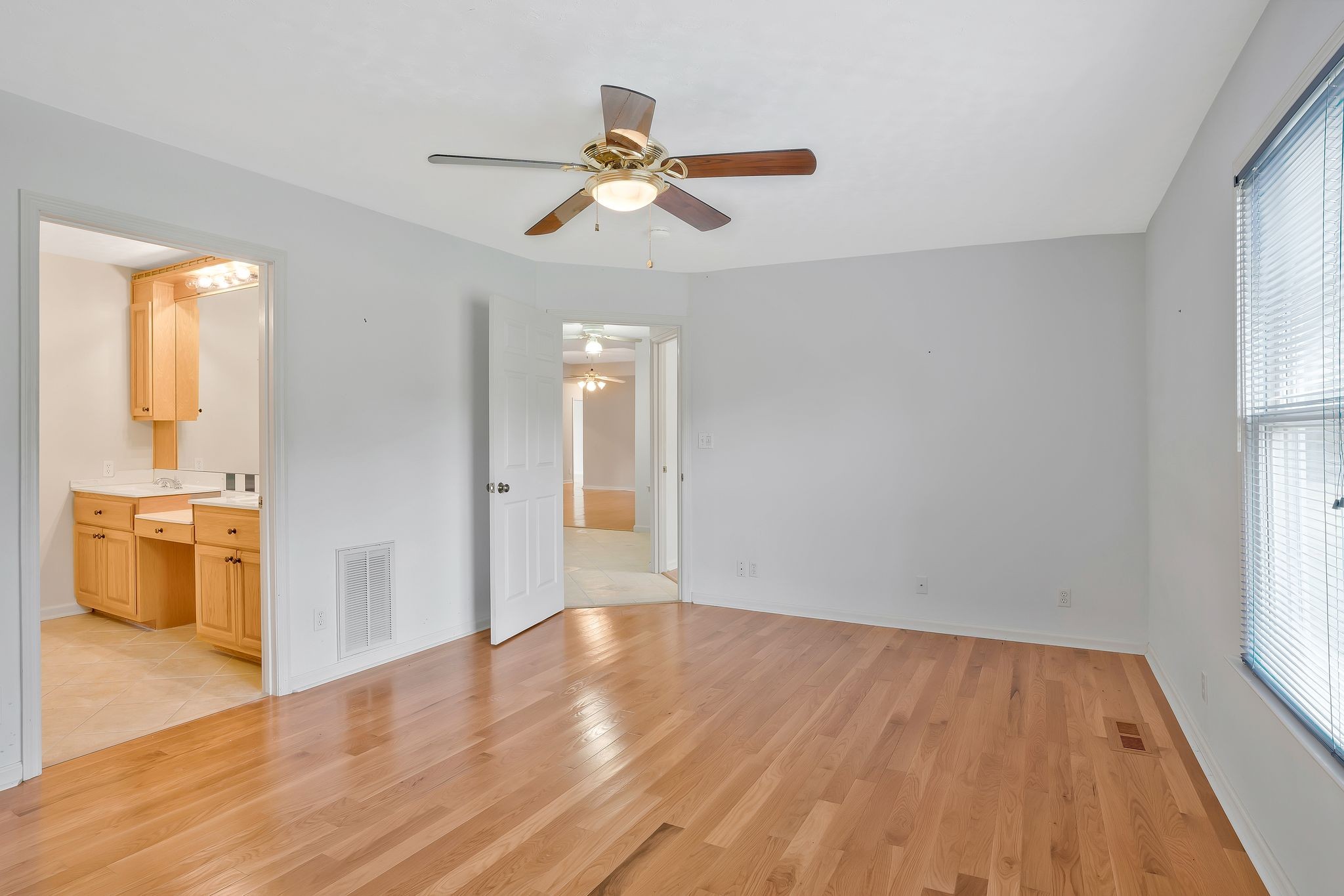 7263 Bidwell Road Joelton, TN 37080 - Photo 21 of 42 Master Bedroom w/Ceiling Fan & View to Backyard