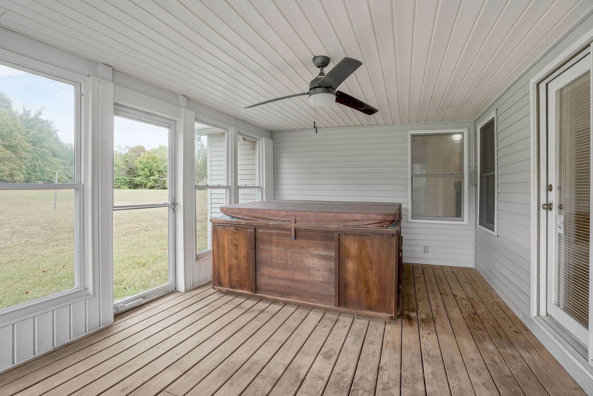 7263 Bidwell Road Joelton, TN 37080 - Photo 35 of 42 19x11 Sunroom enclosed w/Windows & Screen & Hot Tub