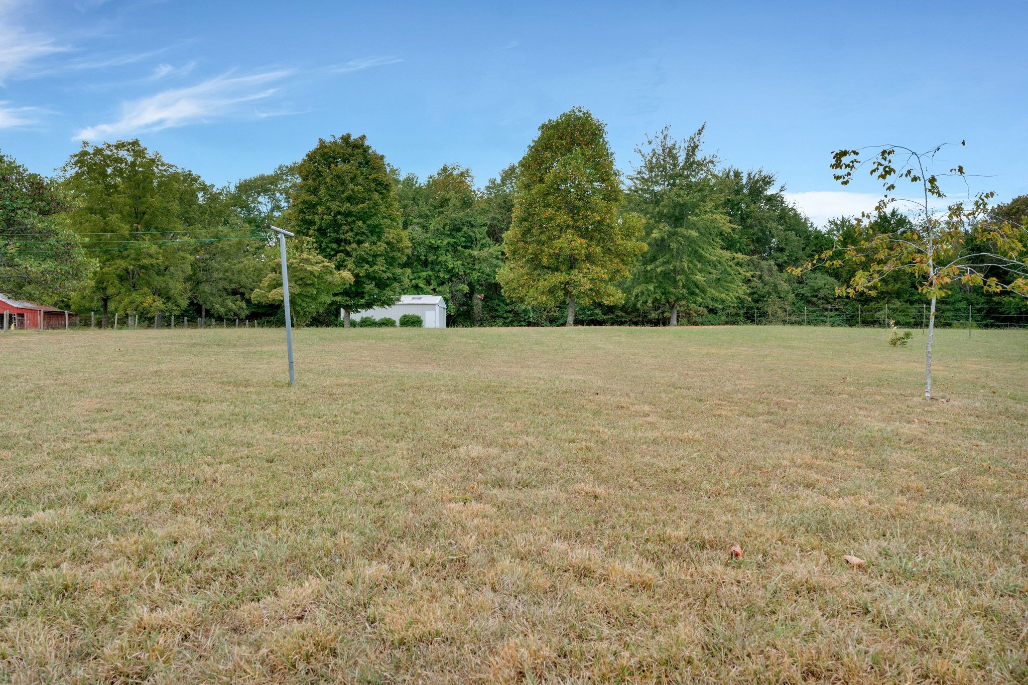7263 Bidwell Road Joelton, TN 37080 - Photo 38 of 42 20x25 Storage Barn w/Sliding Doors on Both Ends in Level Backyard