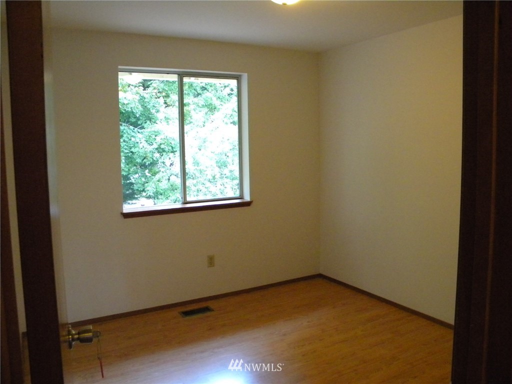 3107 164th Place Southeast Bothell, WA 98012 - Photo 14 of 20 a view of an empty room with a window