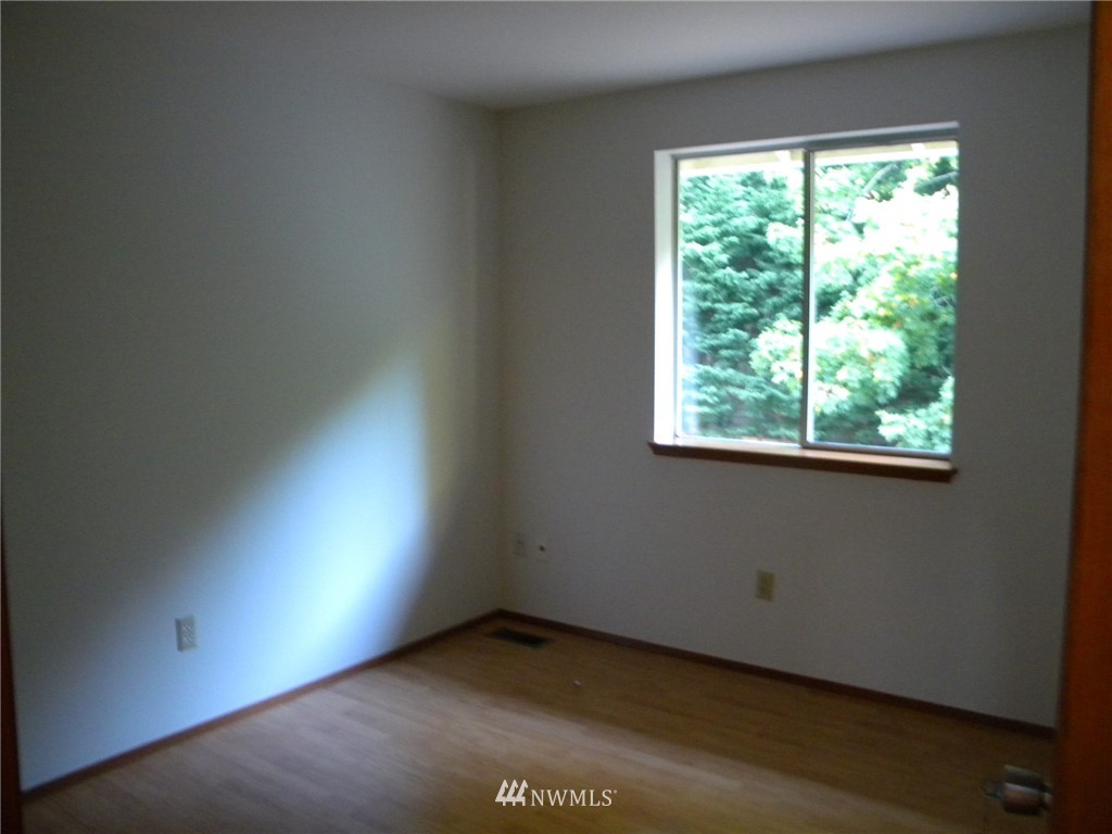 3107 164th Place Southeast Bothell, WA 98012 - Photo 15 of 20 an empty room with a window