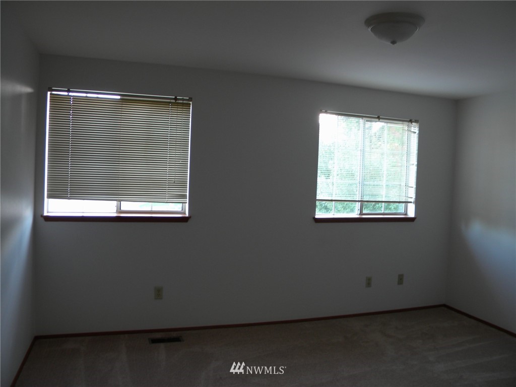 3107 164th Place Southeast Bothell, WA 98012 - Photo 16 of 20 a view of an empty room with a window
