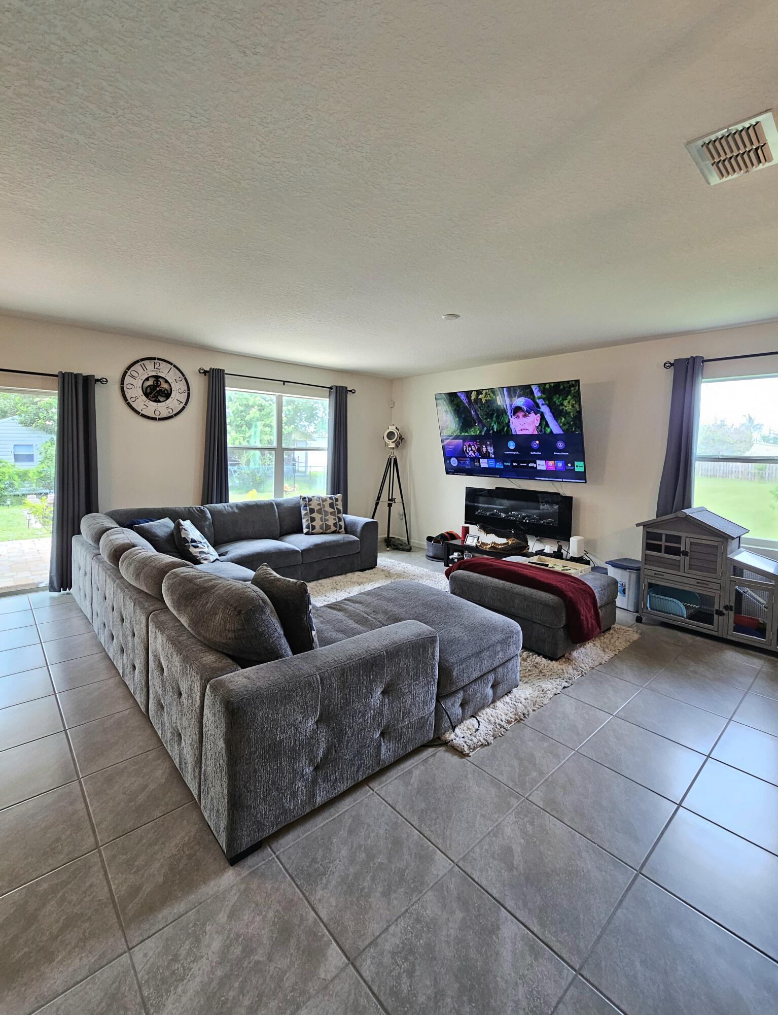 1017 Southwest Longfellow Road Port St. Lucie, FL 34953 - Photo 9 of 23 1017 Living Room