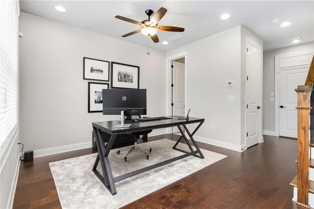 a view of a workspace with furniture