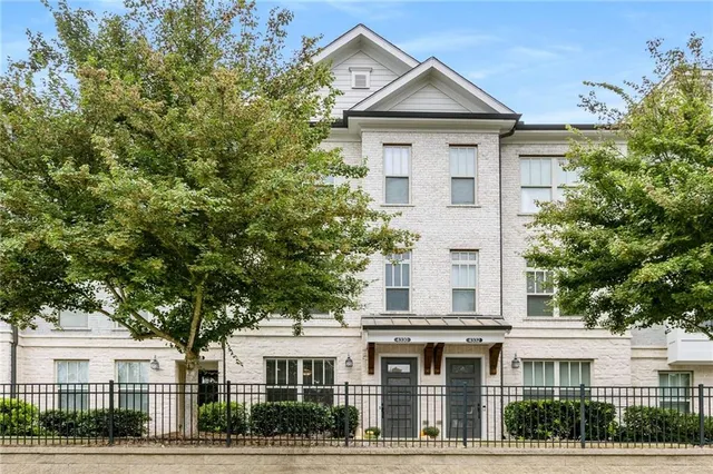 a front view of a large white building