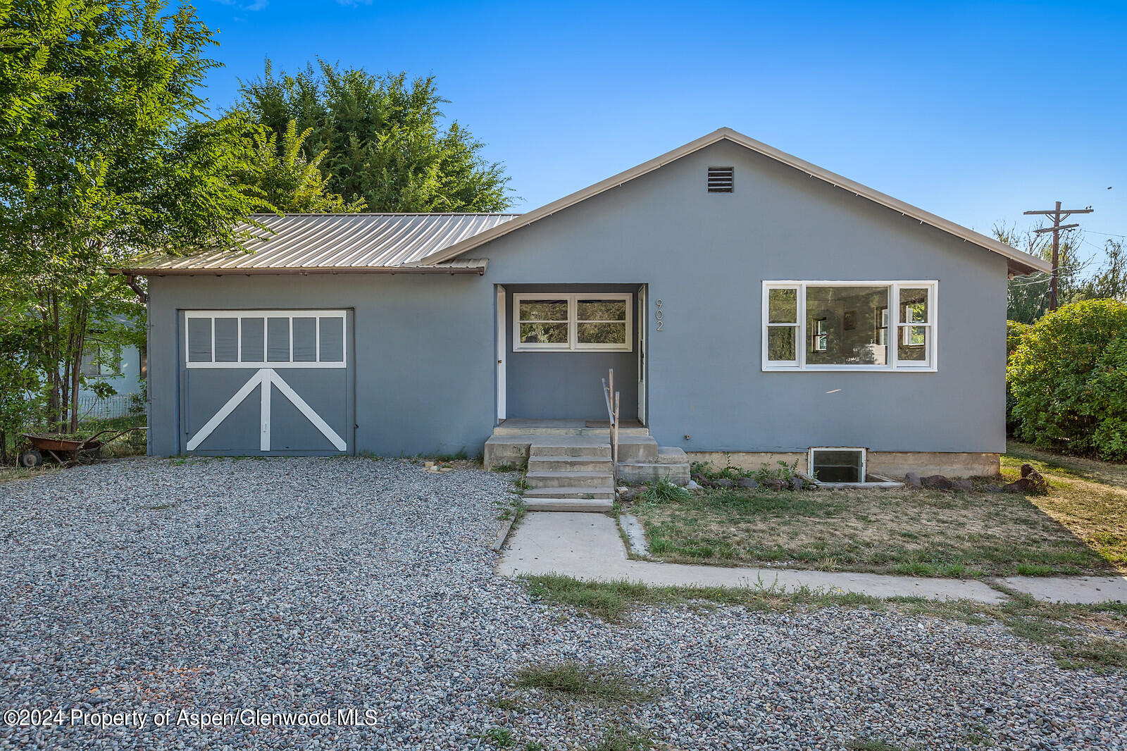 902 Randolph Avenue Rifle, CO 81650 - Photo 1 of 18 a house view with a backyard space