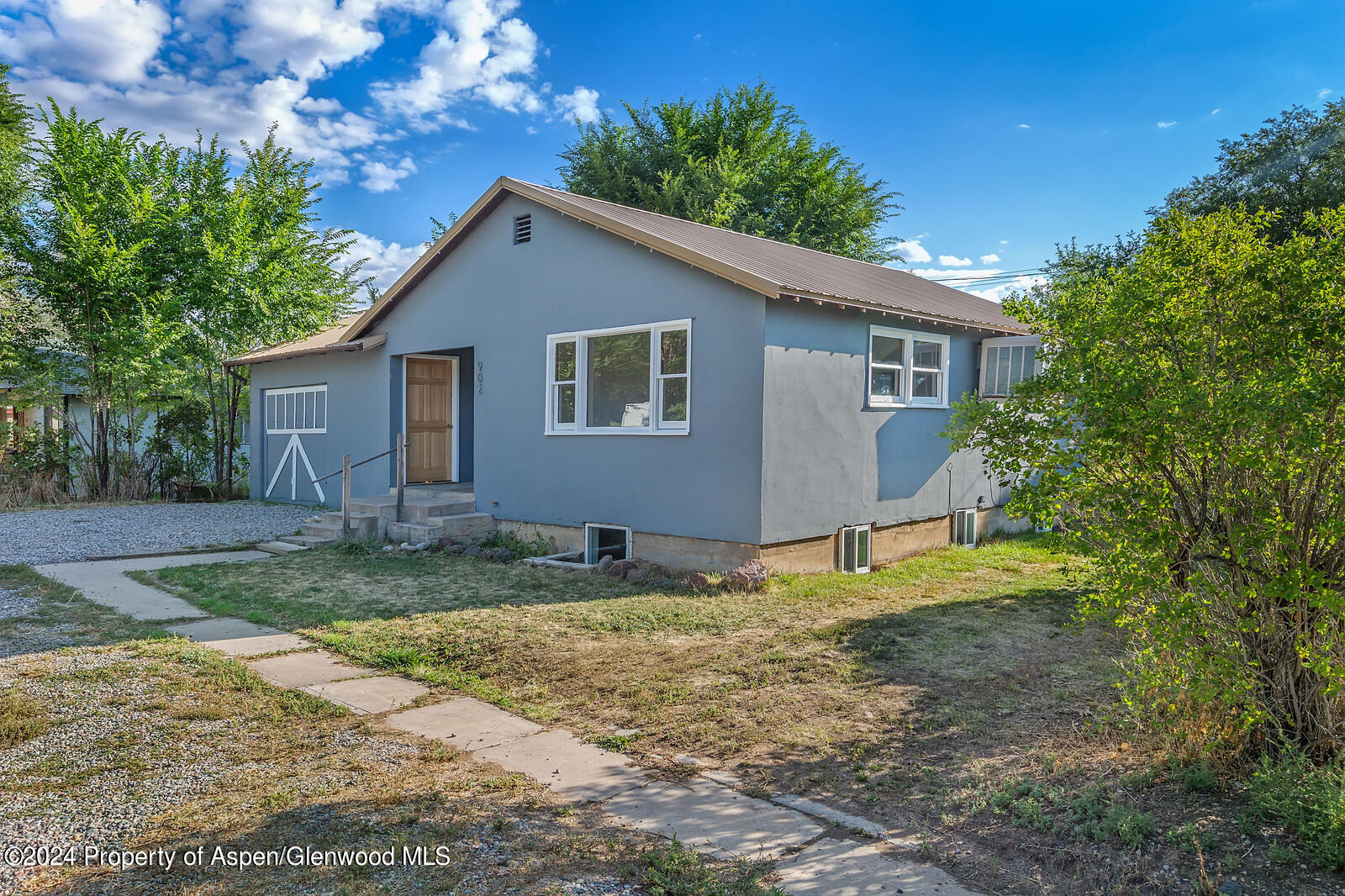 902 Randolph Avenue Rifle, CO 81650 - Photo 2 of 18 a backyard of a house