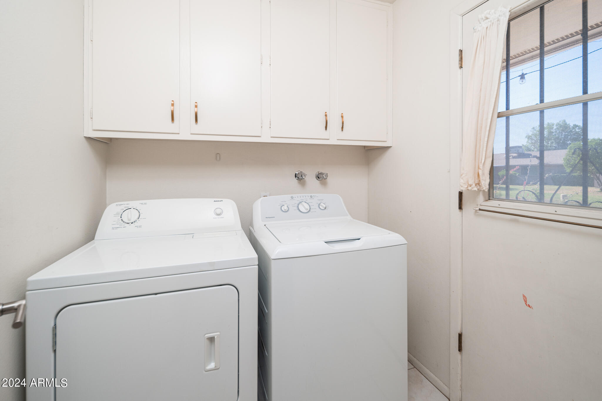 10841 West Hatcher Road Sun City, AZ 85351 - Photo 16 of 45 14_Laundry_01