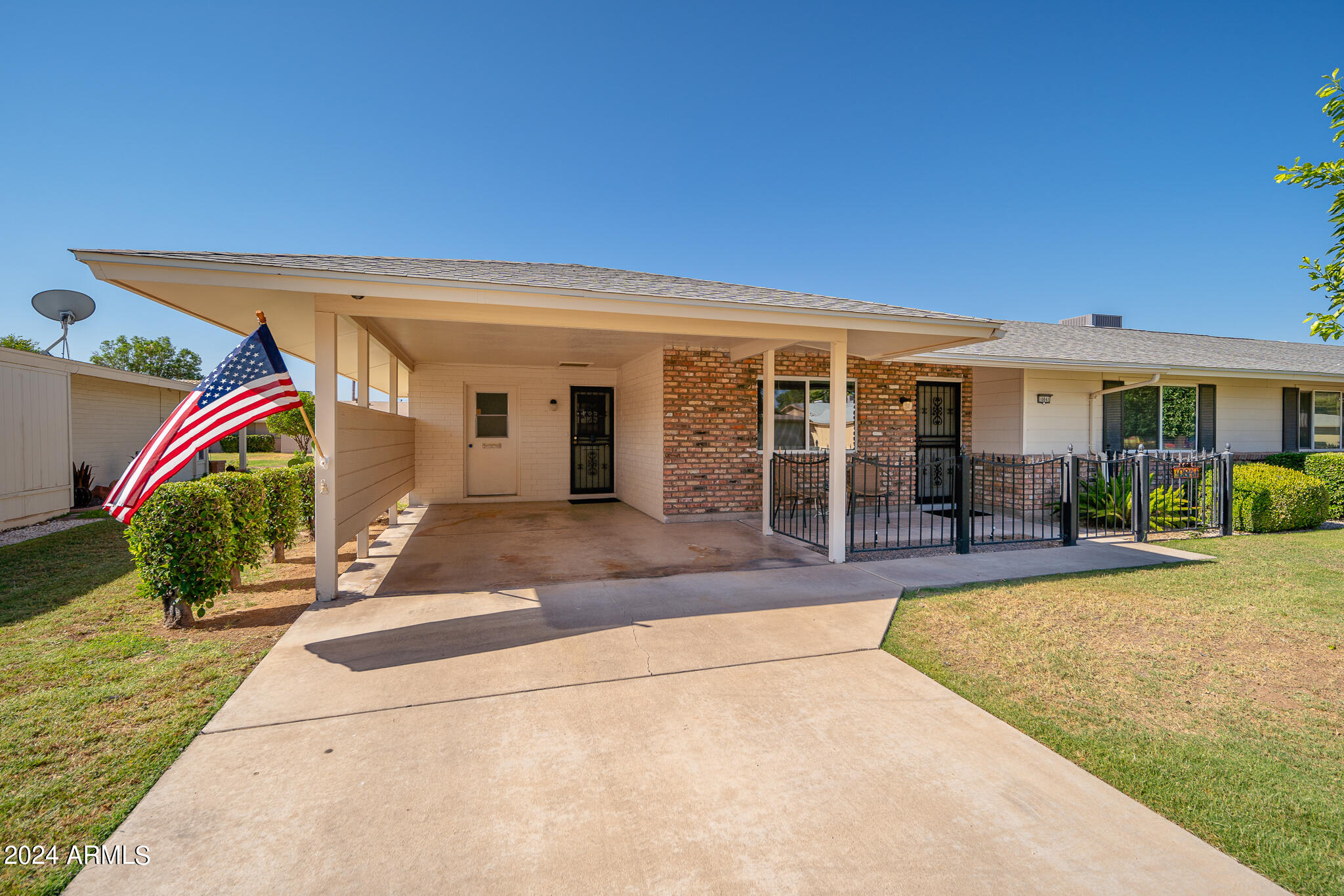 10841 West Hatcher Road Sun City, AZ 85351 - Photo 4 of 45 04_Driveway_01