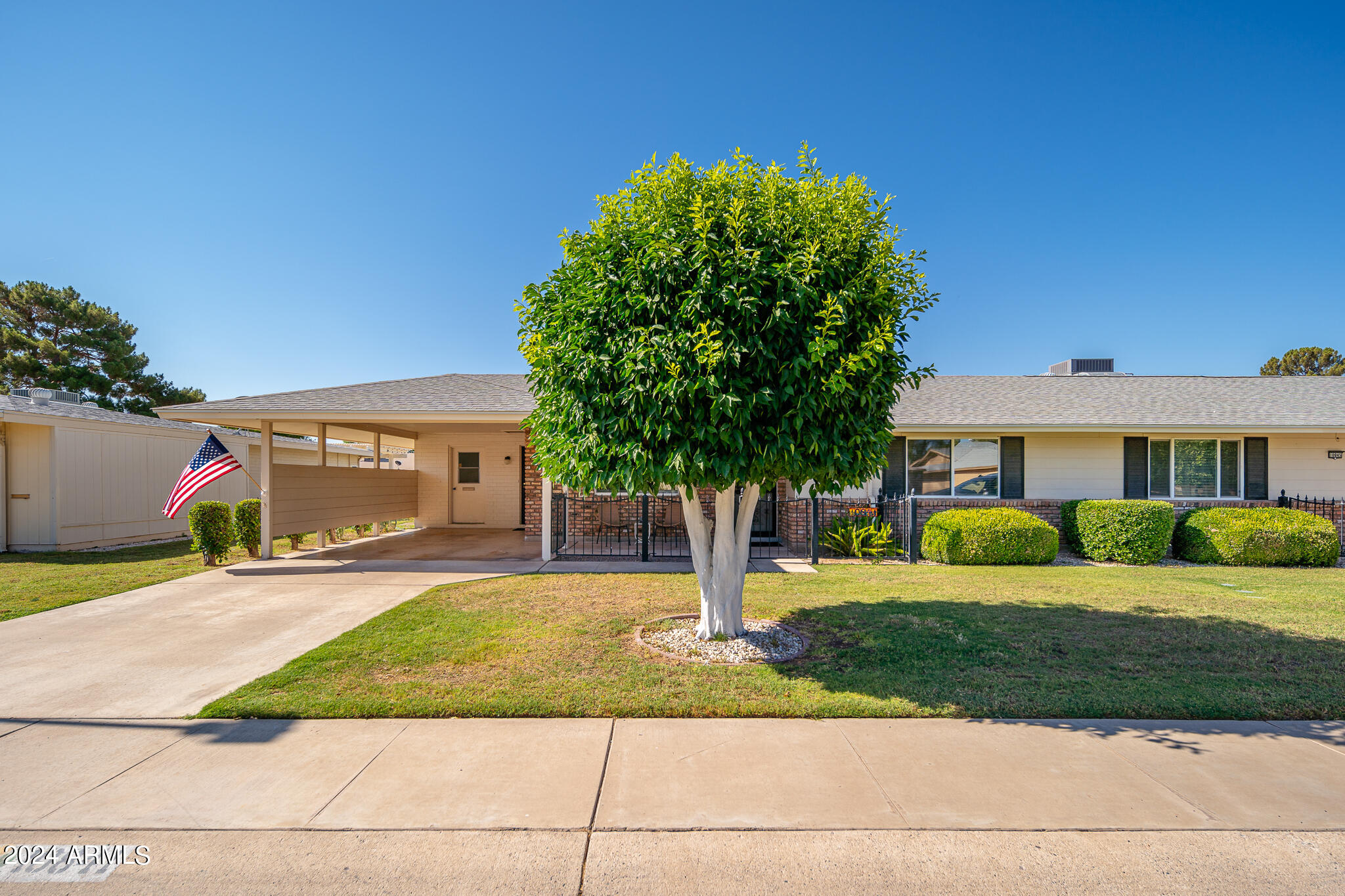 10841 West Hatcher Road Sun City, AZ 85351 - Photo 5 of 45 05_Front_02