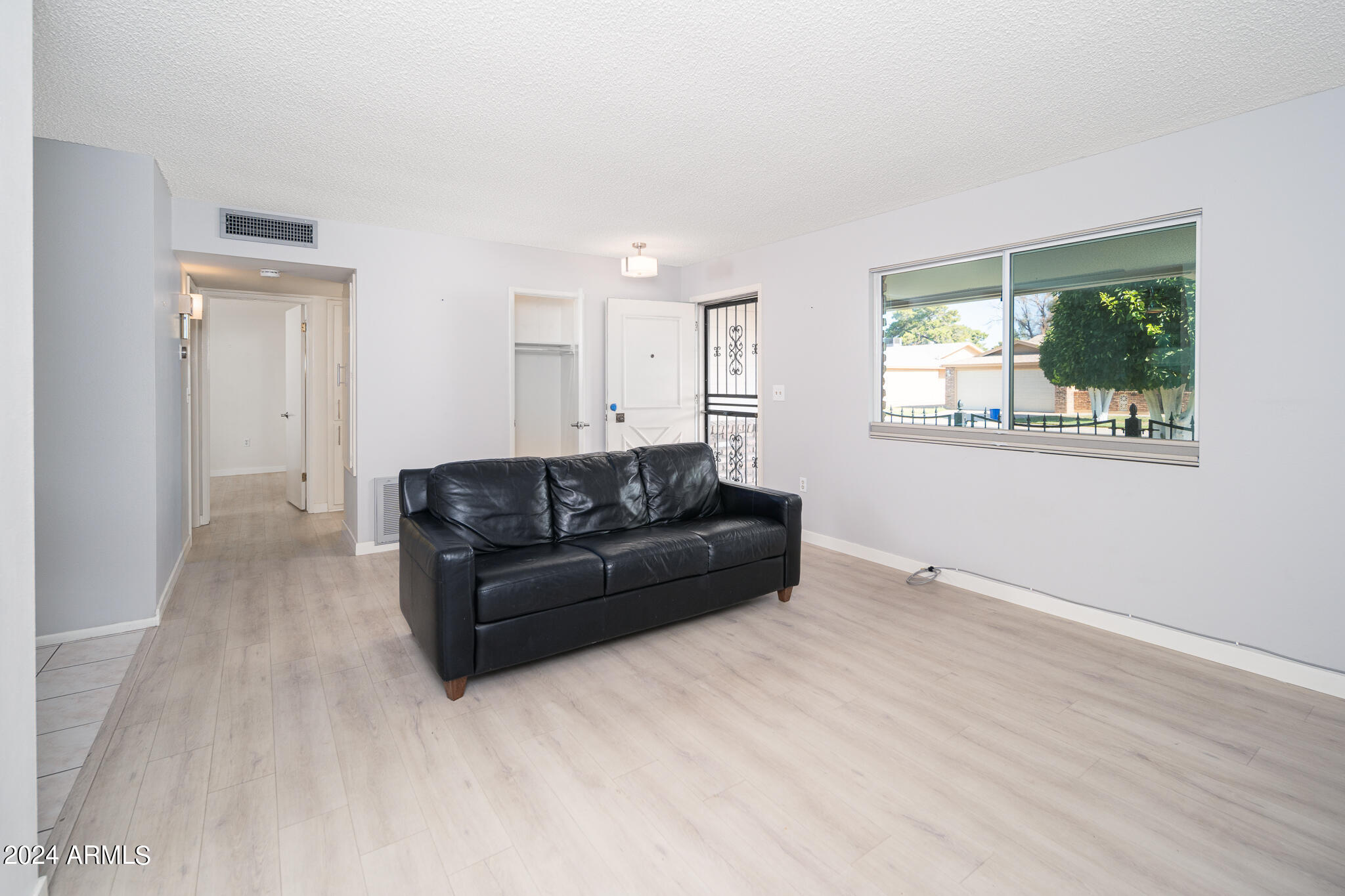 10841 West Hatcher Road Sun City, AZ 85351 - Photo 10 of 45 09_Living-Room_02