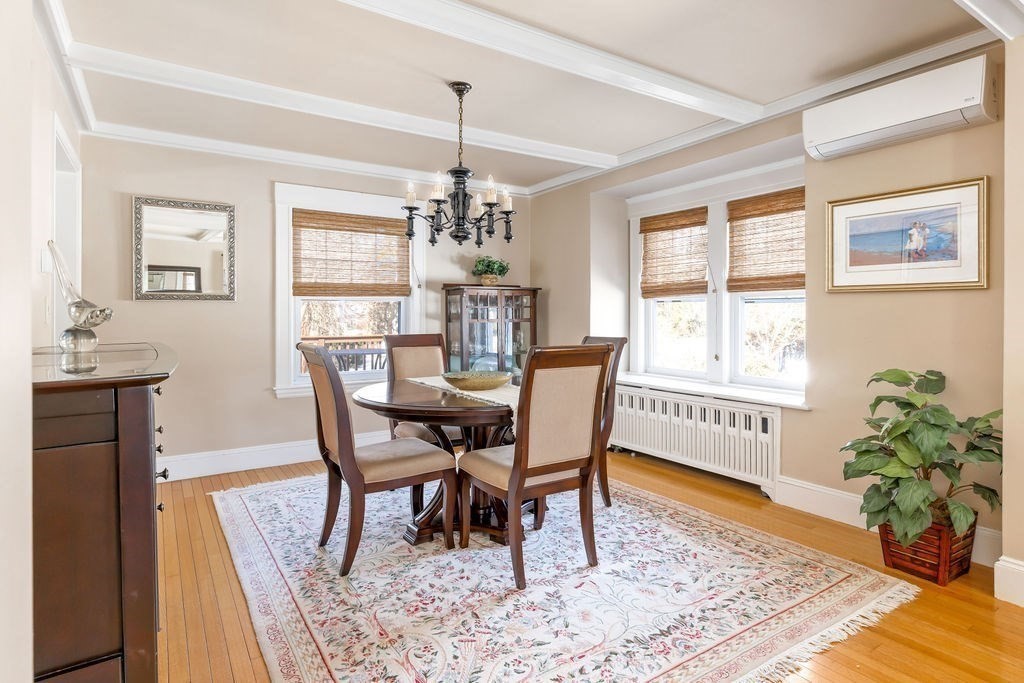 60 High Street Needham, MA 02494 - Photo 9 of 32 a view of a dining room with furniture window and wooden floor