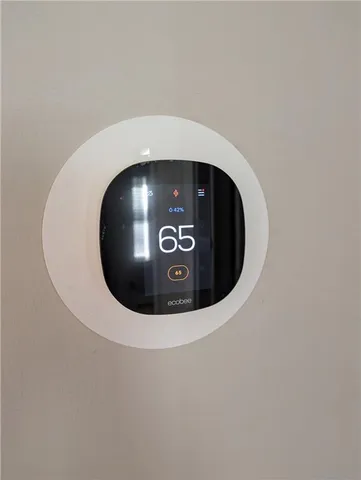 a view of a fence with a small yard