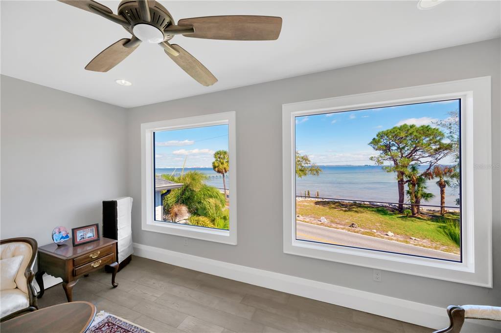 2802 Northpointe Lane Tampa, FL 33611 - Photo 18 of 55 a view of an entryway wooden floor and a chandelier