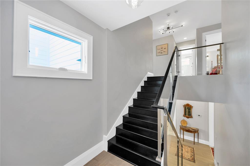 2802 Northpointe Lane Tampa, FL 33611 - Photo 29 of 55 a view of entryway and hall with wooden floor