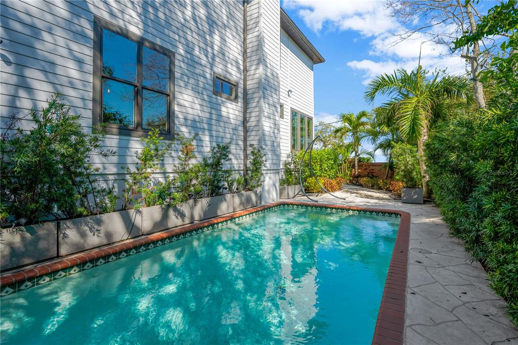 2802 Northpointe Lane Tampa, FL 33611 - Photo 47 of 55 a view of a back yard of the house