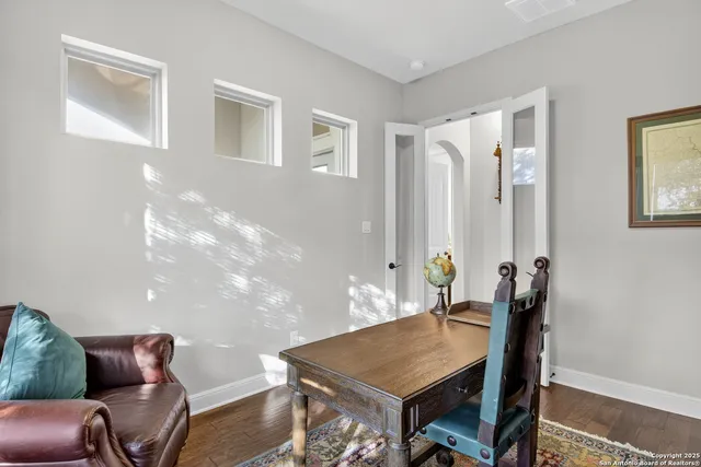 a view of a livingroom with furniture and window
