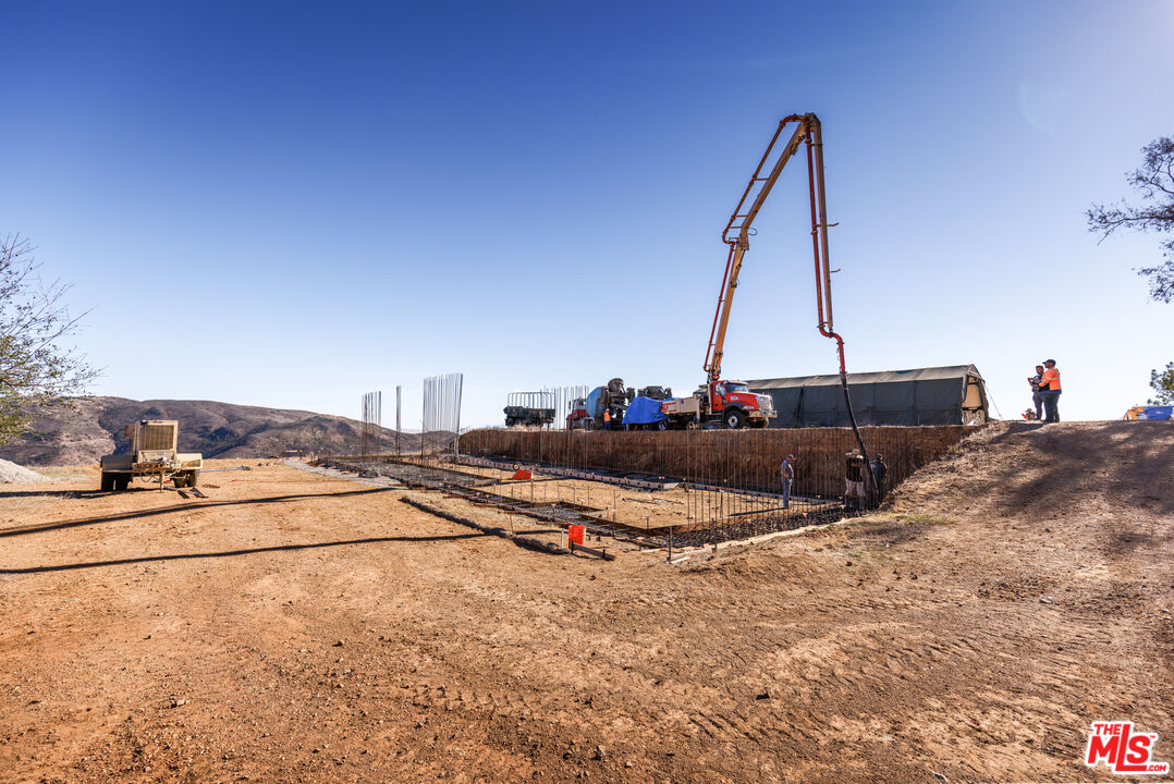 9950 Cotharin Road Malibu, CA 90265 - Photo 20 of 48 a view of a living room with furniture